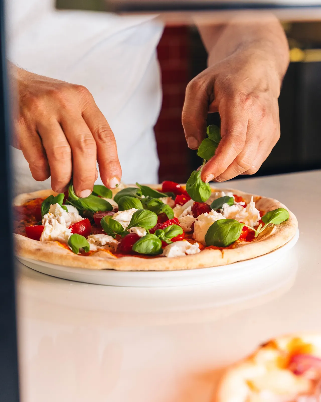Food-Fotografie: Pizza wird bei Spesso belegt
